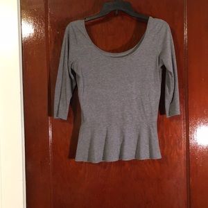 Quarter sleeve peplum top